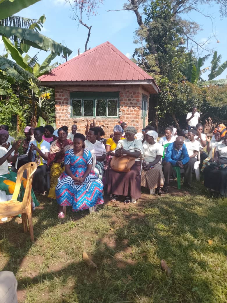 Women learning about SACCO